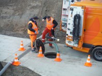 Verwijderen van betonresten in een fietstunnel te Aalst